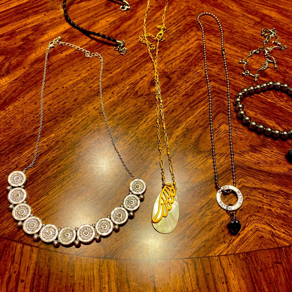 Multiple necklaces and bracelets